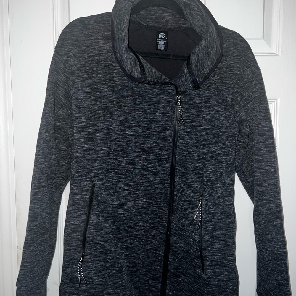Black and gray Champion athletic jacket.